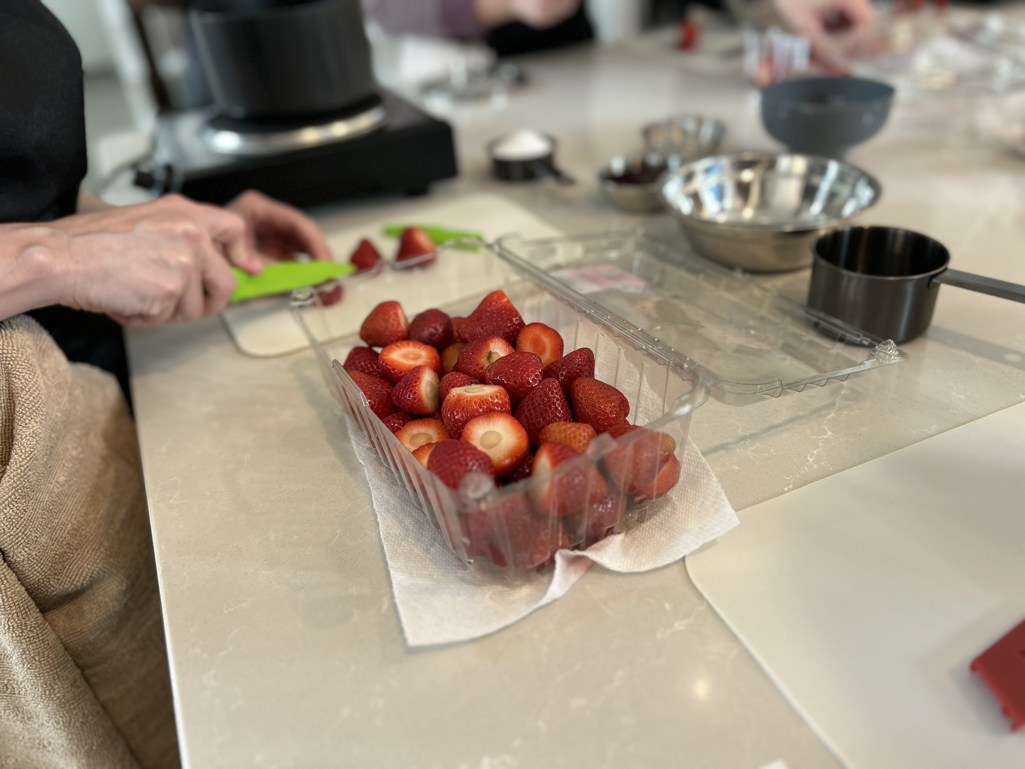 Fresh strawberries being prepped