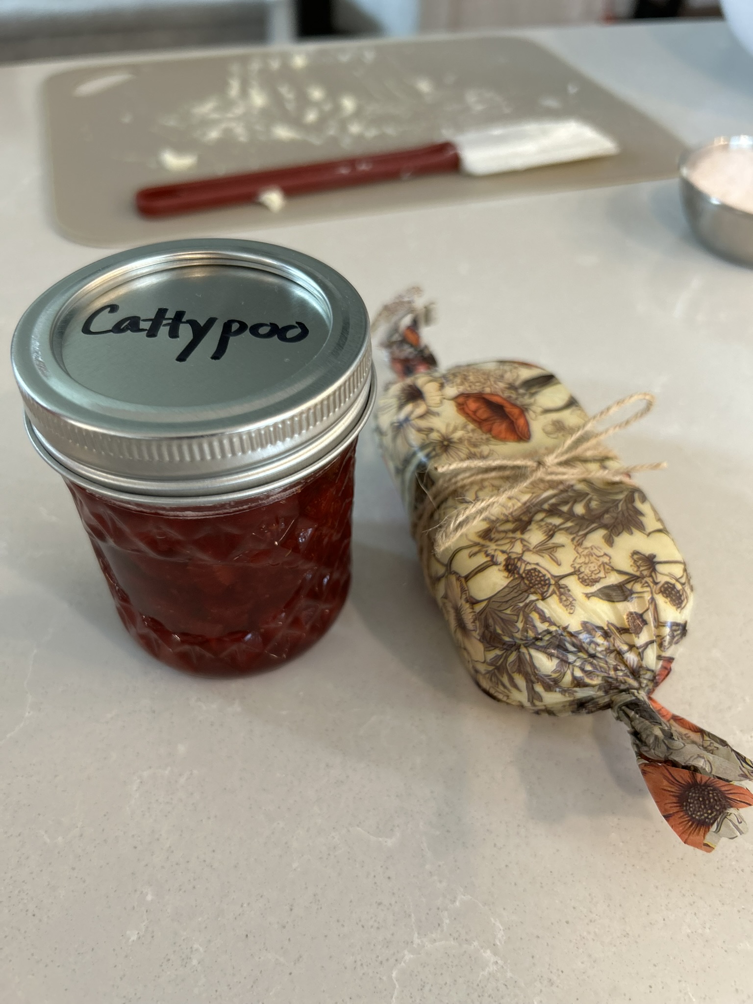Jam jar and wrapped butter — the take-home